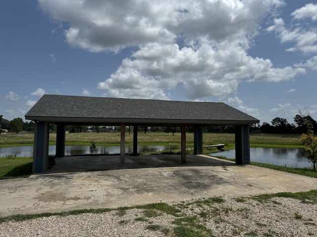 dock area featuring a gazebo and a water view