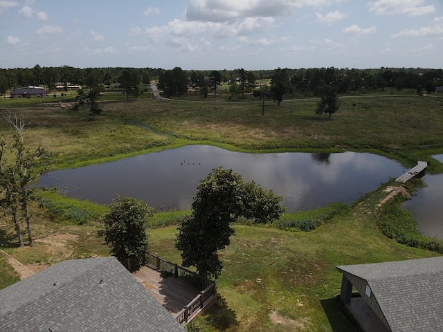 drone / aerial view with a rural view and a water view