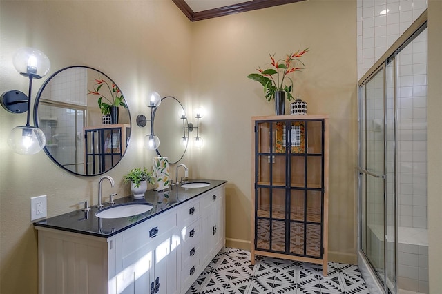 bathroom with vanity, tile patterned floors, walk in shower, and ornamental molding