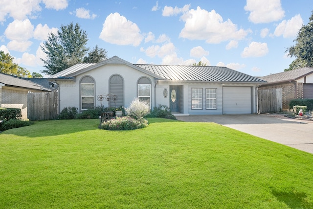 single story home featuring a garage and a front yard