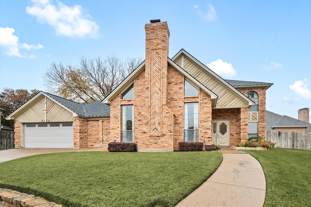 front facade with a garage and a front lawn