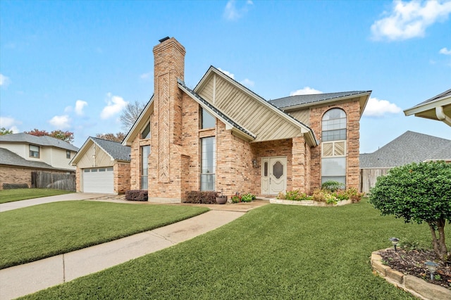 view of front of home featuring a front yard and a garage