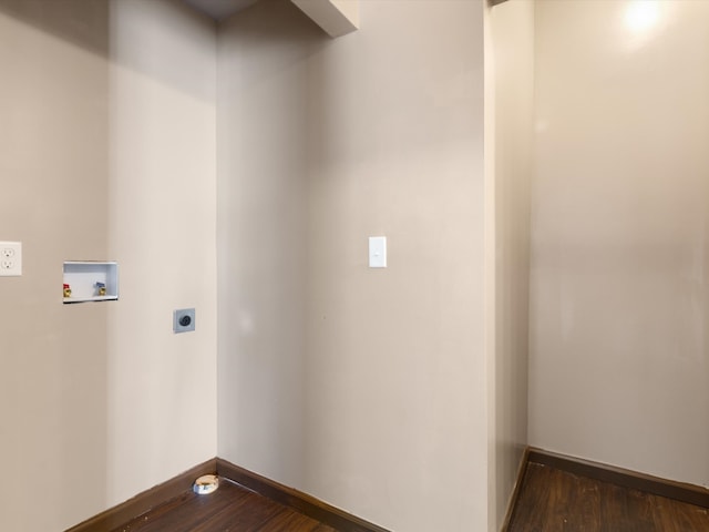 washroom with electric dryer hookup, dark wood-type flooring, and washer hookup