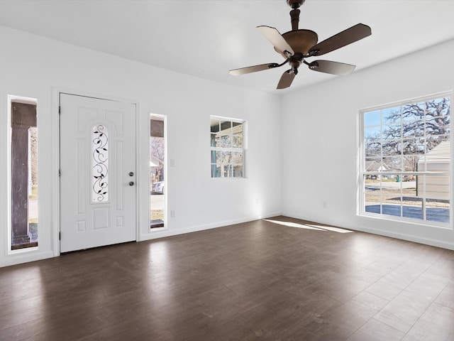 foyer featuring ceiling fan and dark hardwood / wood-style flooring