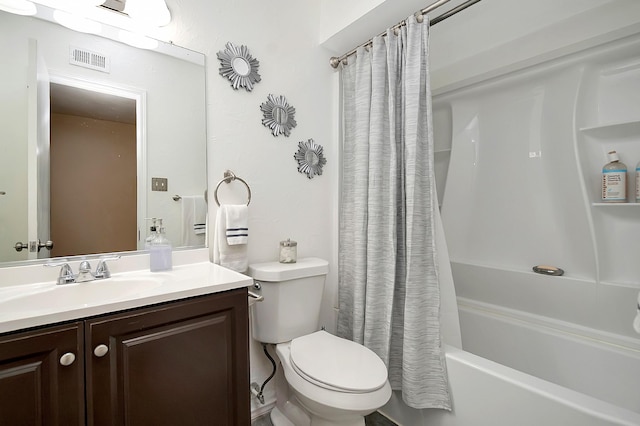 bathroom featuring shower / tub combo, visible vents, vanity, and toilet