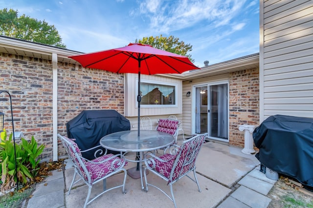 view of patio featuring outdoor dining space and area for grilling