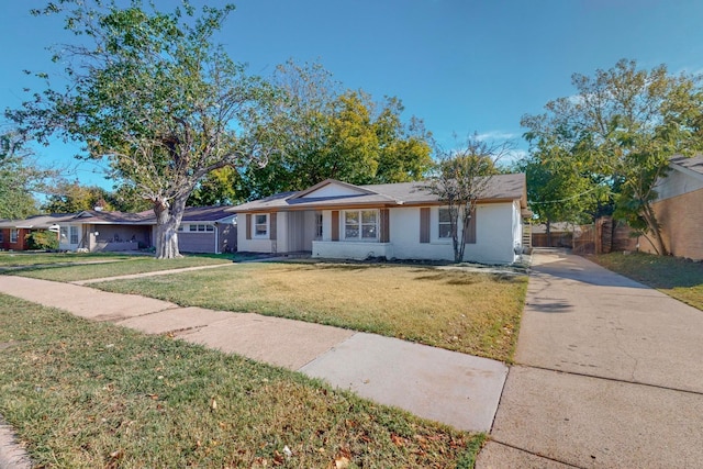 ranch-style home with a front yard