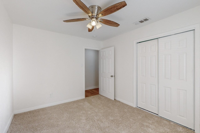 washroom featuring hookup for a gas dryer, hookup for an electric dryer, and light wood-type flooring