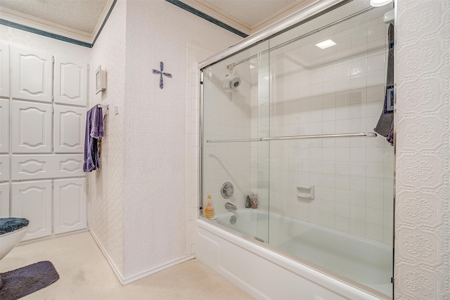 bathroom featuring toilet, ornamental molding, a textured ceiling, and bath / shower combo with glass door