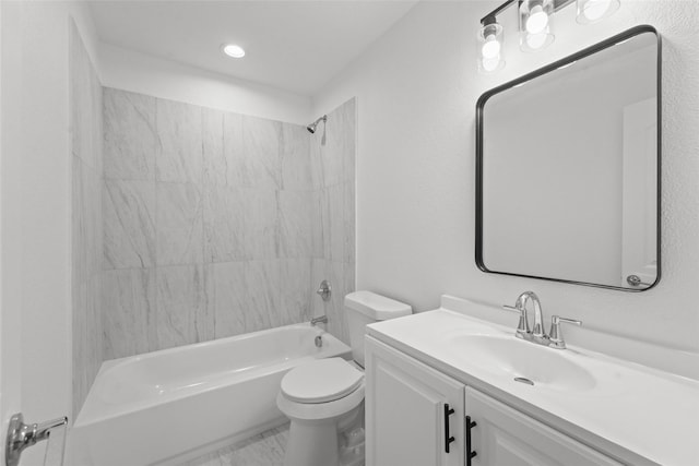 906 Benton St, Bonham, TX 75418 - bathroom with toilet, vanity, washtub / shower combination, and marble finish flooring