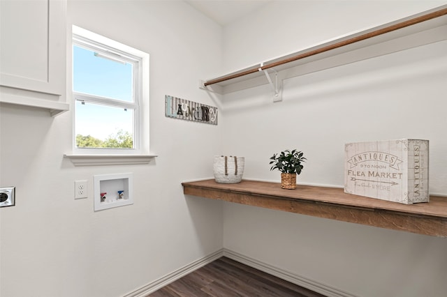 laundry room featuring cabinets, hookup for a washing machine, dark wood-type flooring, and electric dryer hookup