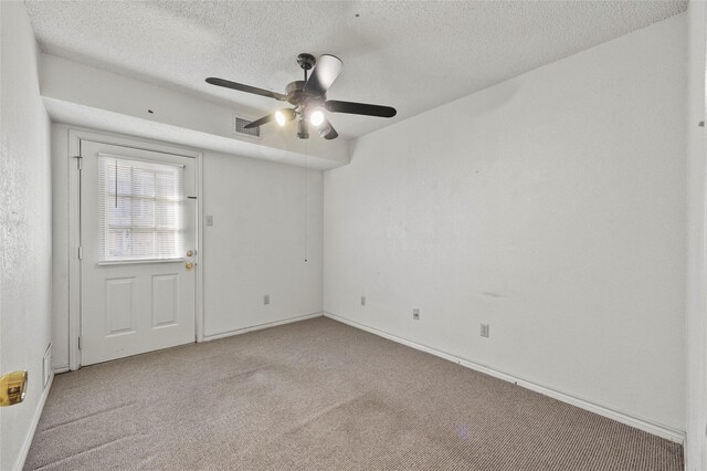 bathroom with a textured ceiling and vanity