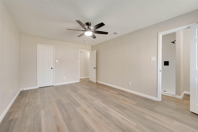 unfurnished room featuring ceiling fan and light hardwood / wood-style floors