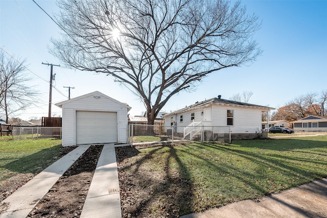 exterior space featuring an outbuilding, a garage, and a lawn