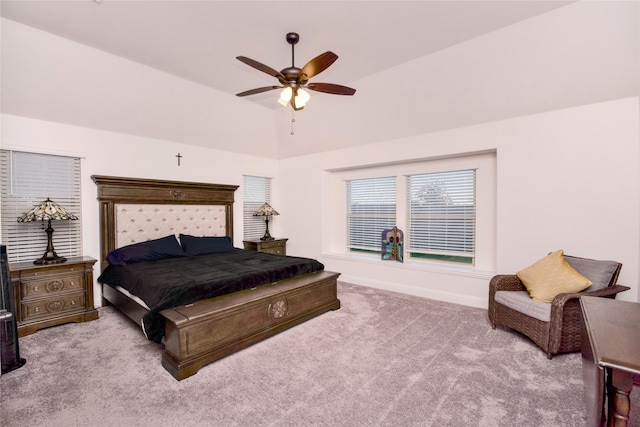 bedroom featuring light colored carpet, ceiling fan, and lofted ceiling