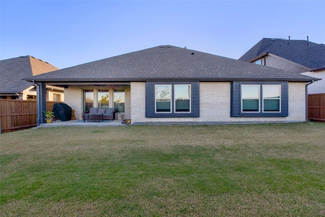 1927 Frediano Ln, Mclendon Chisholm, TX 75032 - back of property featuring brick siding, roof with shingles, an outdoor hangout area, and a patio area