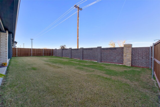 view of front of home with a lawn