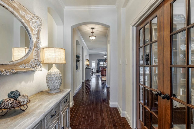 hall featuring ornamental molding, dark hardwood / wood-style floors, and french doors