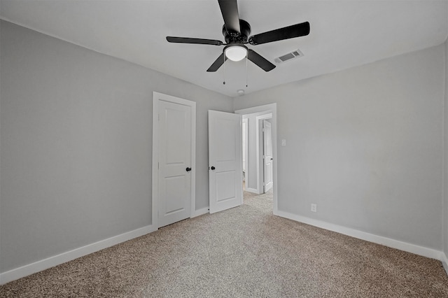 unfurnished bedroom with carpet floors and ceiling fan