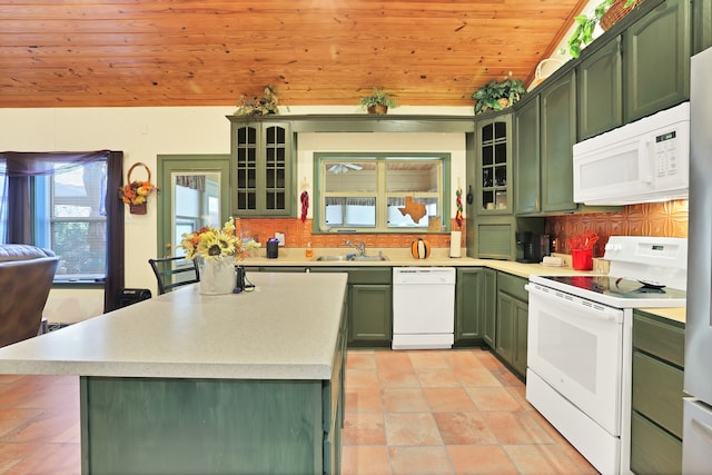 kitchen with decorative backsplash, white appliances, sink, wooden ceiling, and green cabinets