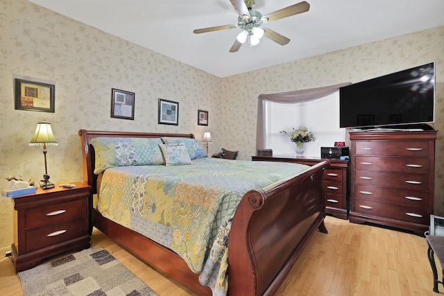 bedroom featuring ceiling fan and light hardwood / wood-style flooring