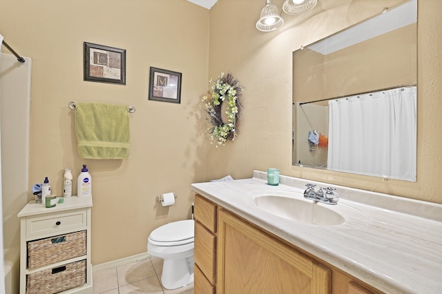 bathroom featuring tile patterned flooring, vanity, toilet, and a shower with curtain