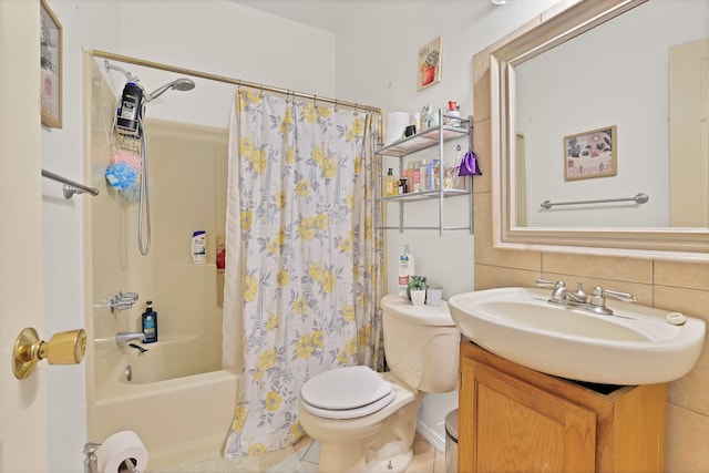 full bathroom featuring vanity, decorative backsplash, toilet, shower / bath combo with shower curtain, and tile walls