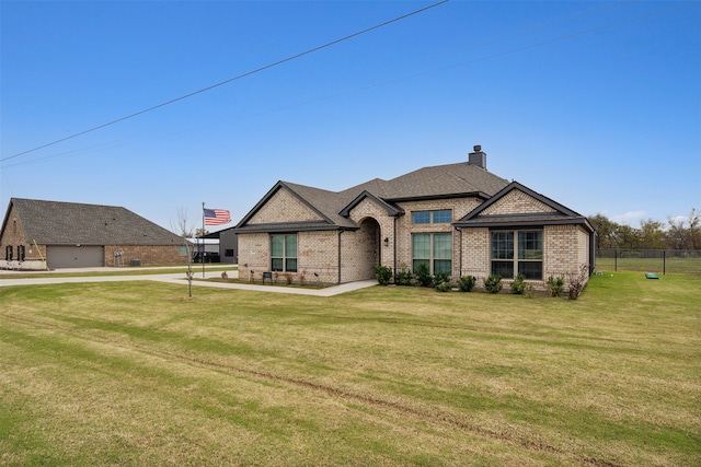 view of front facade with a front lawn