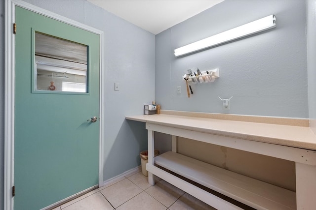 bathroom featuring tile patterned flooring