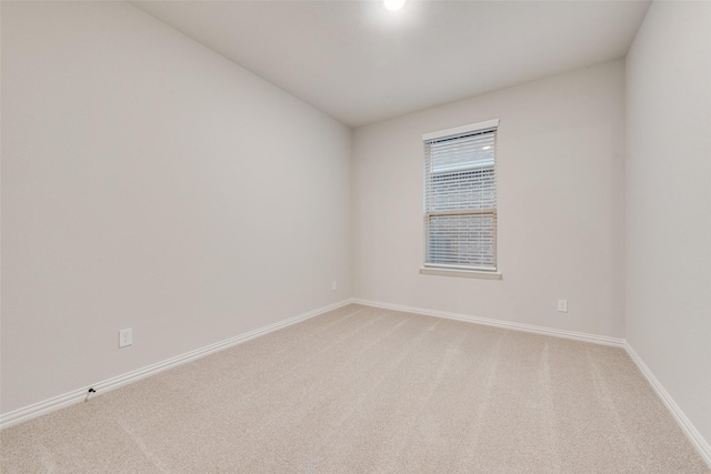 unfurnished room featuring carpet floors