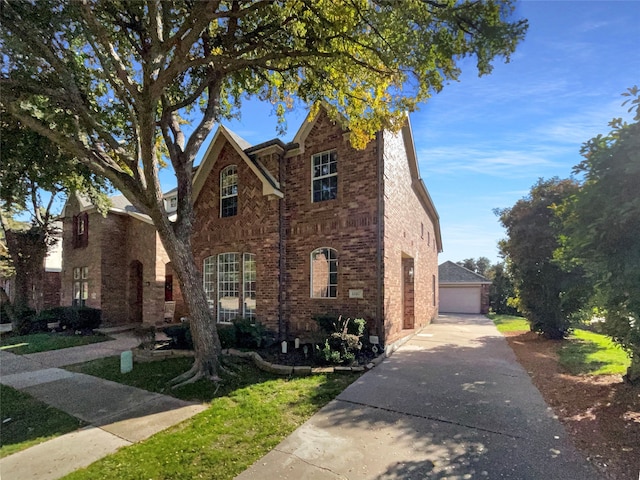 view of front of house with an outbuilding and a garage