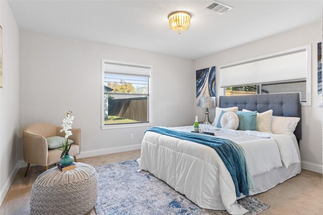 bedroom featuring carpet