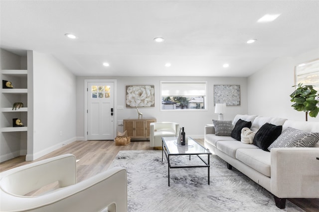 living room with light hardwood / wood-style floors