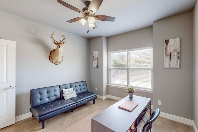 living room featuring ceiling fan