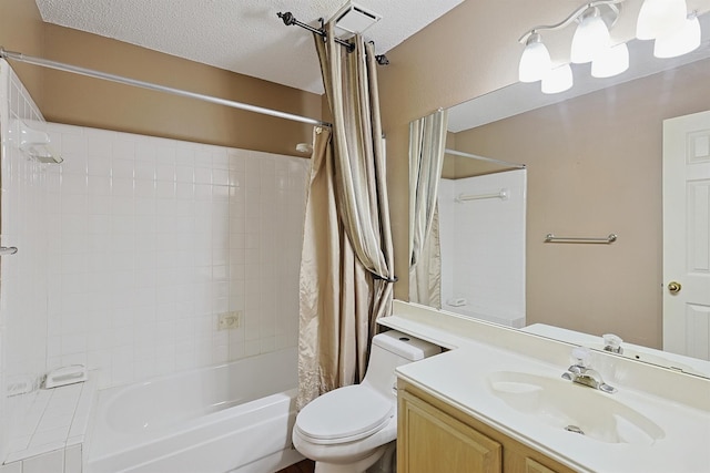 full bathroom with vanity, toilet, a textured ceiling, and shower / bath combo