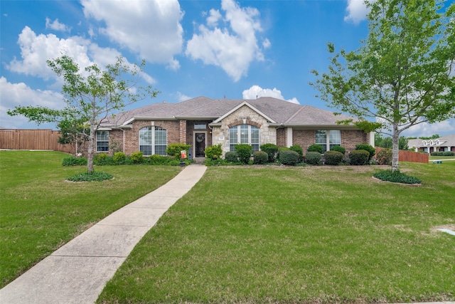 ranch-style house with a front yard