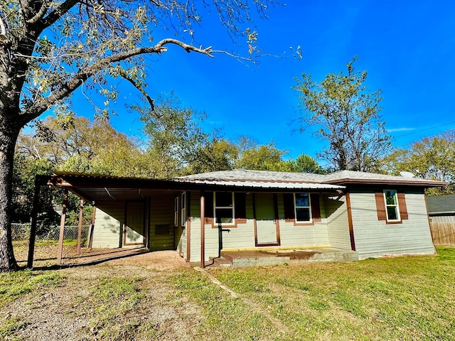 ranch-style home with a front yard