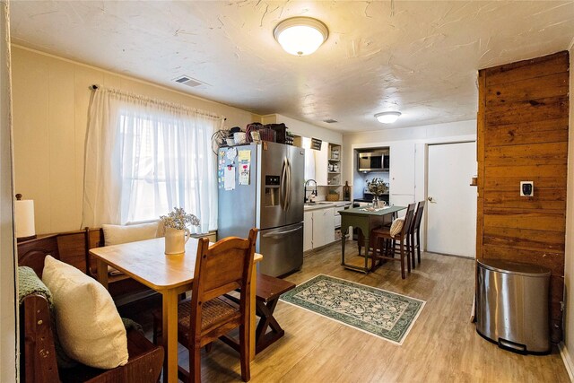 dining room featuring hardwood / wood-style flooring