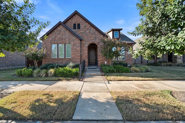 view of front of home with a front yard