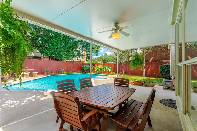 view of pool with a patio and ceiling fan