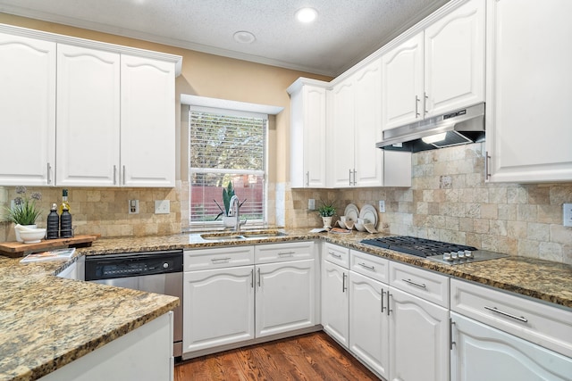 kitchen with sink, white cabinets, stainless steel appliances, and a textured ceiling