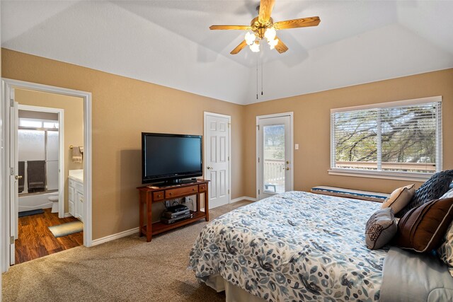 carpeted bedroom with connected bathroom, access to exterior, ceiling fan, and vaulted ceiling