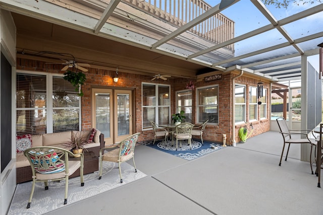 view of patio featuring ceiling fan