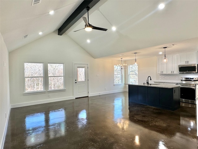 kitchen with white cabinetry, sink, stainless steel appliances, light stone counters, and pendant lighting