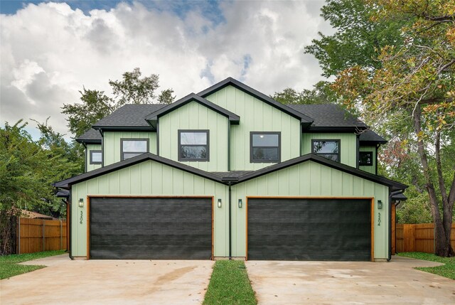 modern farmhouse featuring a garage