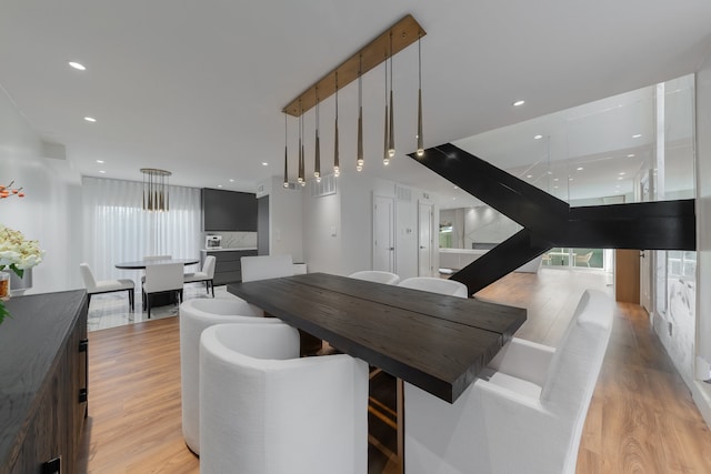 dining room with light hardwood / wood-style flooring