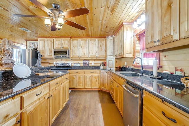 kitchen with sink, wood ceiling, light brown cabinets, and appliances with stainless steel finishes