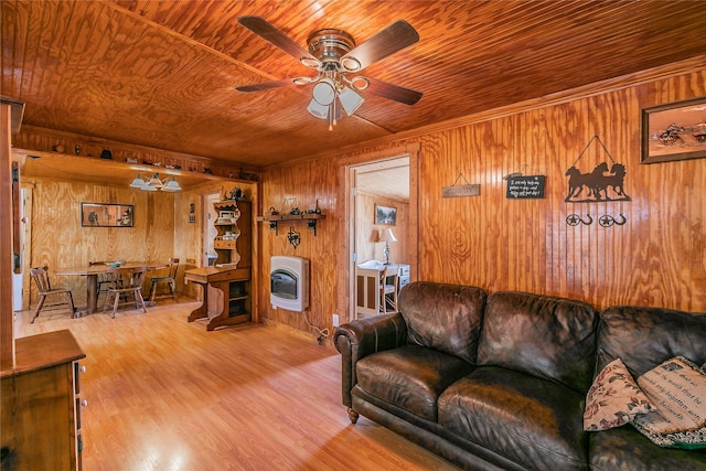 living room with wood walls, wooden ceiling, and light hardwood / wood-style flooring