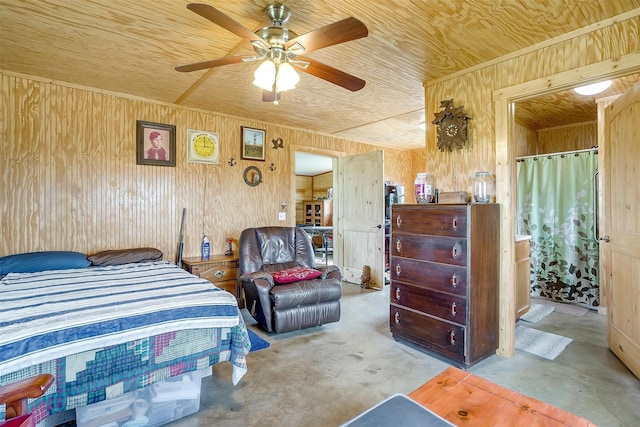 bedroom featuring wooden ceiling, ceiling fan, and wooden walls