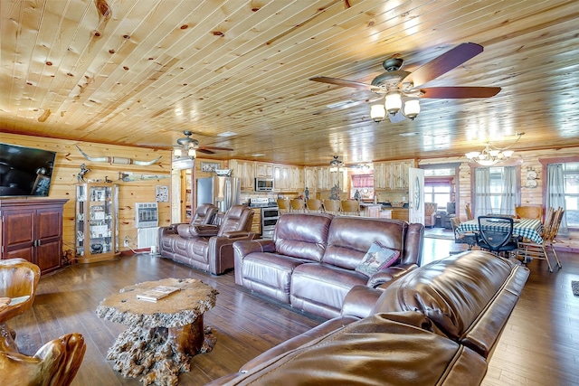 living room featuring hardwood / wood-style floors, ceiling fan with notable chandelier, wooden ceiling, and wooden walls